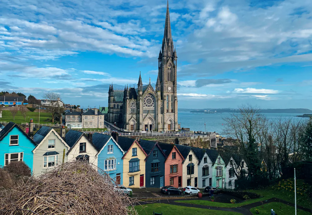 Colourful houses below St Colman's Cathedral in Cobh, County Cork